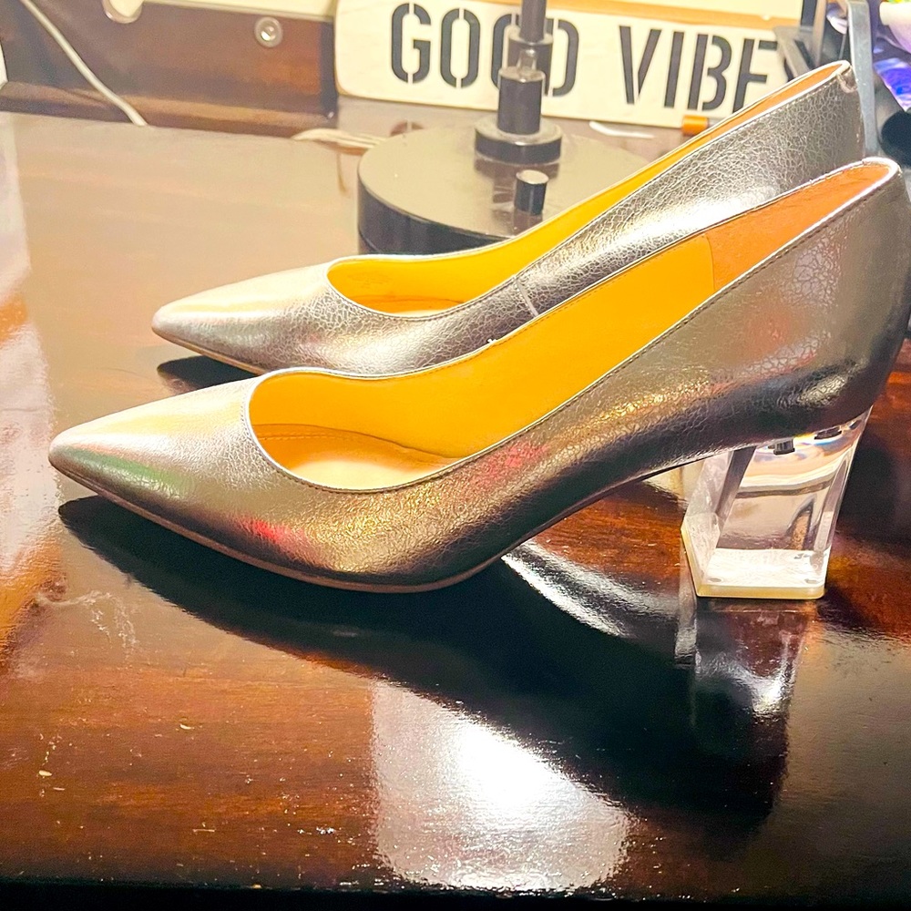 Silver Size 11 Pumps. Pre- loved. Only worn once.